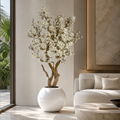 Magnolia blanc dans un vase sphérique laqué pour décoration intérieure | Solérive