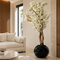 Cerisier blanc dans un vase Globe noir laqué pour décoration intérieure | Solérive